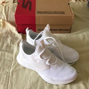 Brand New Pair of White trimmed in Pink Skechers, sneakers .  REDUCED!!